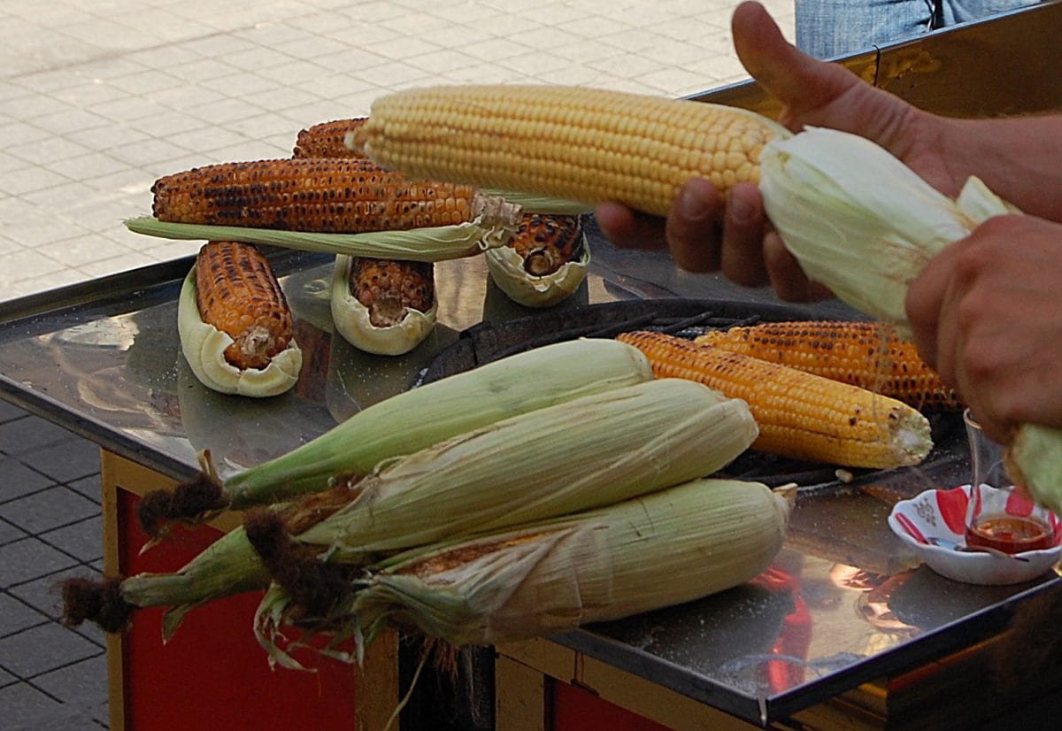 Selling corn on the cob in a street market
